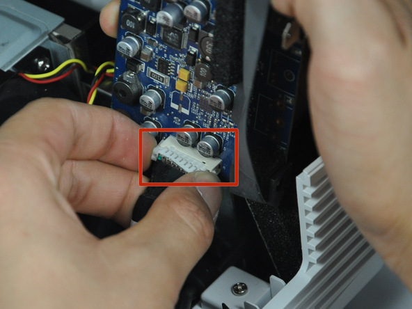 Image 1/1: To remove, pinch both sides of the connector and pull it away from the circuit board.