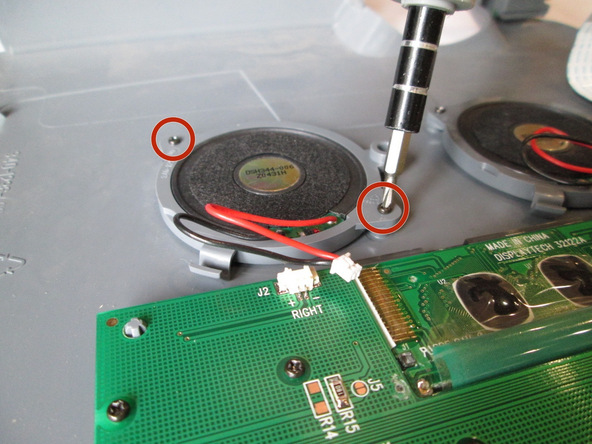Image 2/3: Use the Phillips 0 screwdriver to remove the four 5.5 mm screws.